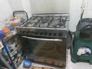 غسالة اتوماتيك و ثلاجة و بوتجاز